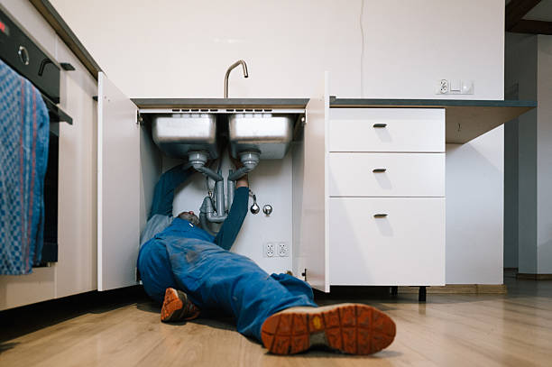 Professional Drain Cleaning technician working in East Greenwich, RI